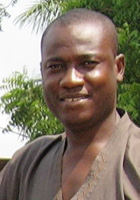 portrait of Wisdom Akpabli